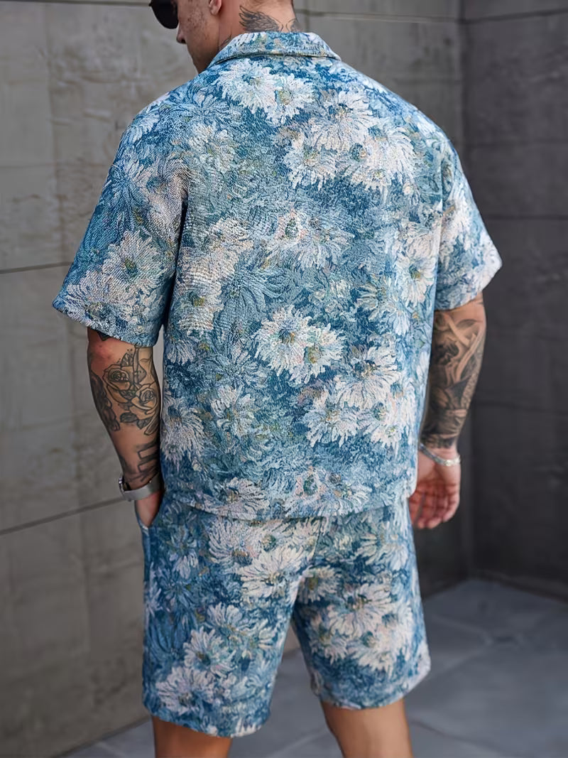 Men's Trendy Two-Piece Set: Floral Print Lapel Shirt with Full Button-Front and Contrast Buttons, Paired with White Drawstring Shorts. Ideal for Daily Casual Wear, Beach Vacations, and Street Style. New Summer Collection.